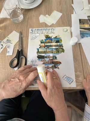 Nahaufnahme einer Sommer-Collage, gestaltet von Seniorin in der Tagespflege Leipzig.